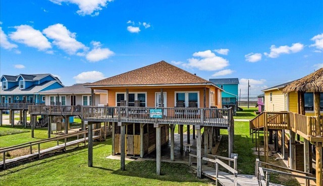 Beautiful Views everywhere you look! Great property steps to the sand!