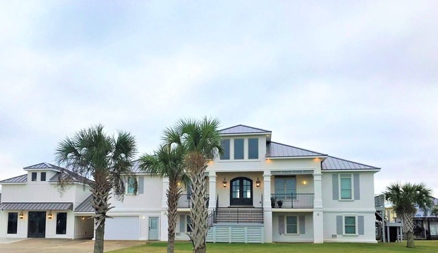 BEAUTIFUL WATERFRONT HOME WITH BOATHOUSE AND HUGE PORCHES!