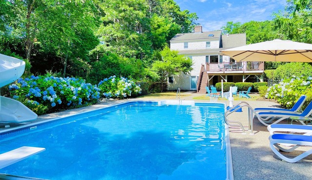 Cape Cod vacation home offers heated pool and close proximity to beaches in Brewster