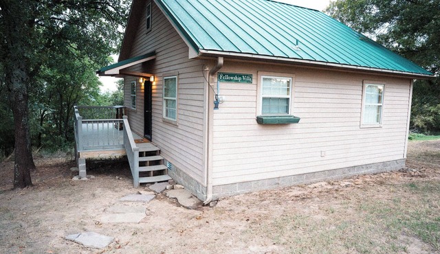 Cozy 2-bedroom cottage with loft, AC, and WiFi on peaceful 295-acre property