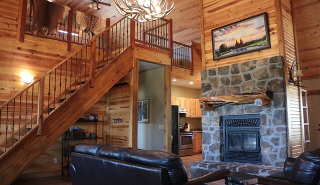 Cozy cabin nestled in the Ozarks with beautiful views from the front porch.