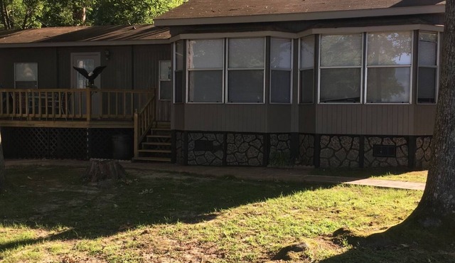 Cozy on the lake lodging with kayaking and fishing supplies furnished.