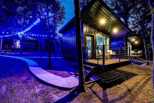 Enchanted Woodland Cabins by the Mountain in Texas with Private Pond and Scenic Trails