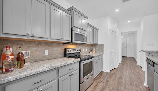 Gorgeous! 4/4.5 Townhome in Aggieland - The Revelry