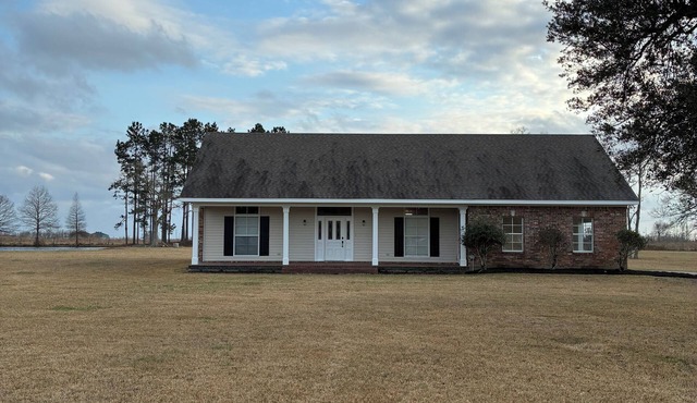 House on Driftwood Hill. 2B/2B on 10 acres with pond.