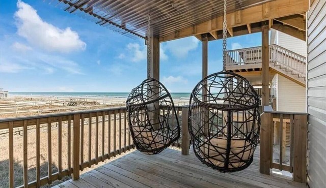 Luxury Beachfront Condo with Covered Deck Steps From Beach & Golf Cart Rental