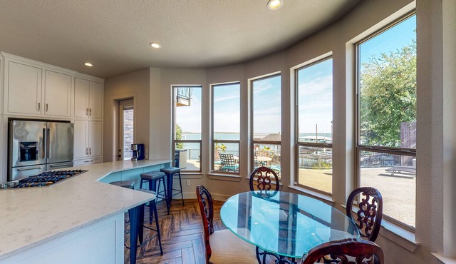 Luxury Lake Home with Stunning Water Views, Private Hot Tub & Gourmet Kitchen