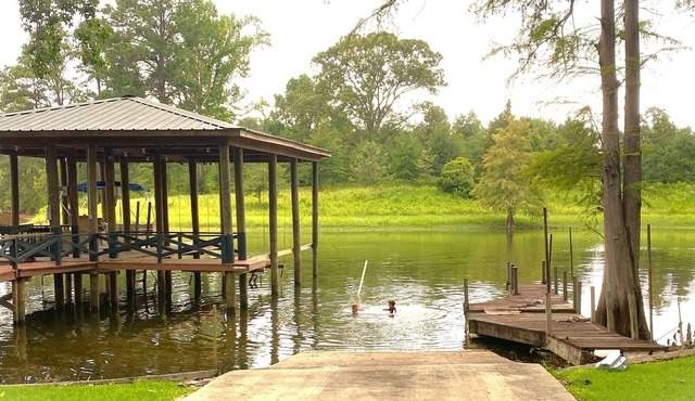 Newly Renovated Lakefront home with boat house, launch and 2 piers!