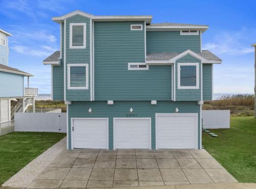 Oceanfront home with pool, large decks, fire pit and private walkover to the beach