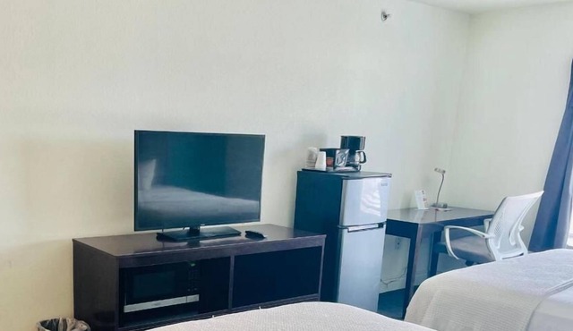 Pet-Friendly Double Queen Room at FairBridge Inn & Suites Cuero, Free Parking!