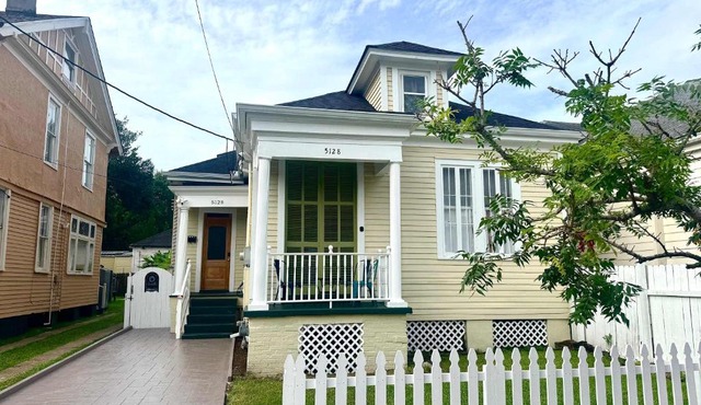 Prime Uptown Villa with Backyard and EV Parking