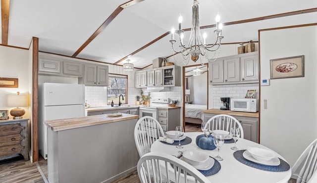 Relax on the water at this lakefront cabin with private dock access, fishing pier, and kayaks included.