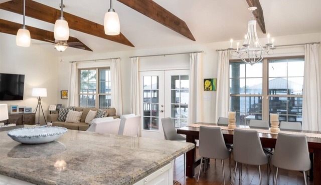 Screened porch and private pier on False River