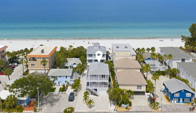 Shore Beats Working - Luxury IRB Retreat, Pool, 1-Min Walk to Beach, Sleeps 10 in Indian Rocks Beach