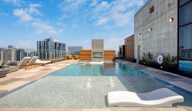 Sleeps 16 | Brand New Austin High Rise w/Rooftop Pool, Gym, Yoga Studio & More!