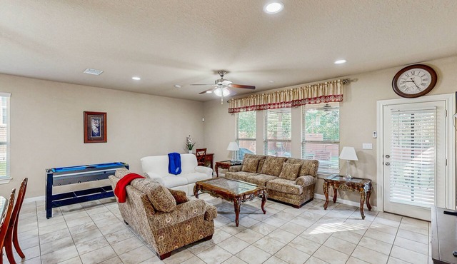 Snowbird-friendly home with private hot tub, foosball, air hockey, grill, patio