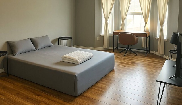 Spacious comfortable King room. Work-friendly. High-speed internet w/50" TVs
