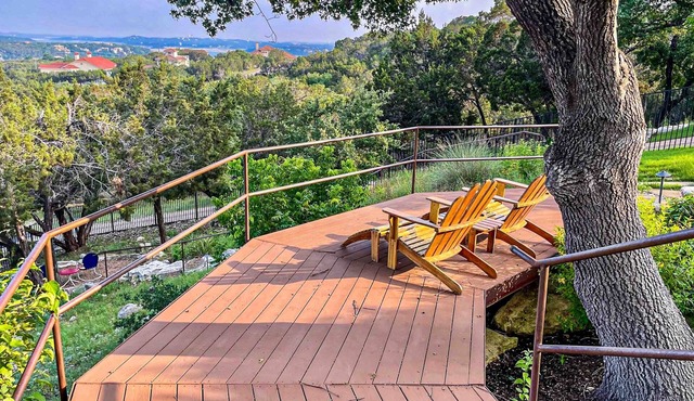 Spacious home with scenic balcony views and fenced in yard