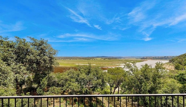 Spacious lakefront hideaway with decks, grill, billiards, tennis & pool
