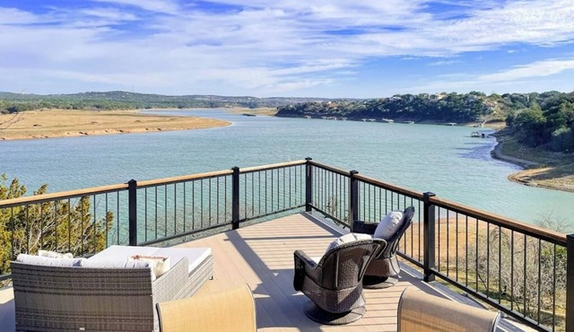 Stunning lakefront home with 2 patios, chef's kitchen, & lake access