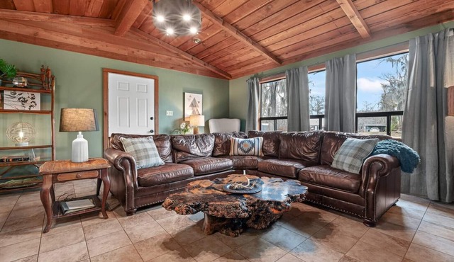 Warm, Rustic Lodge with private dock access directly across the street, featuring a firepit & picnic table for outdoor dining