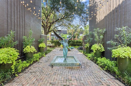 Peak's Suburban Addition Condo | Enjoy a sophisticated stay in this modern 1-bedroom suite with high-end amenities and access to a shared on-site jacuzzi—ideal for work trips or weekend getaways