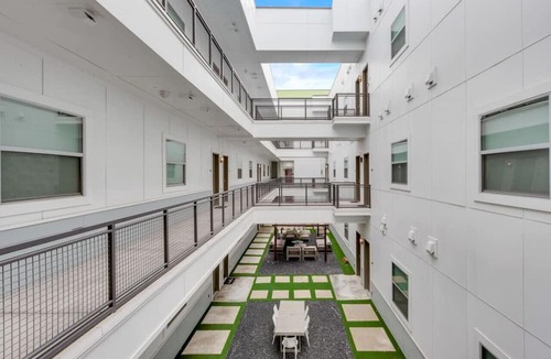 Cedars Apartment | Sleek loft style 2BR I Gym I Parking I Workspace