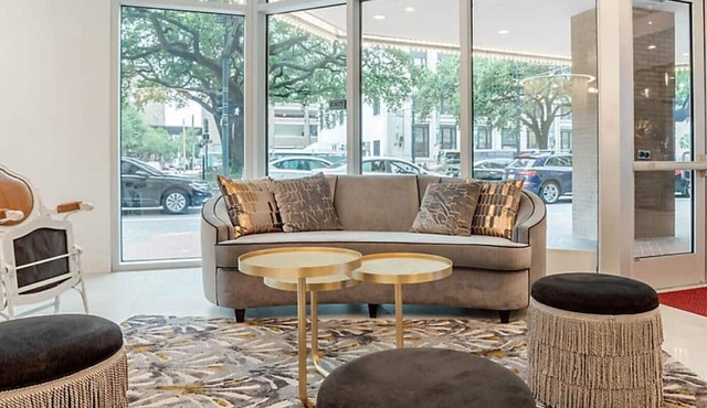 Enjoy ESSENCE FESTIVAL WEEKEND with rooftop deck, pool and gym amenities!!